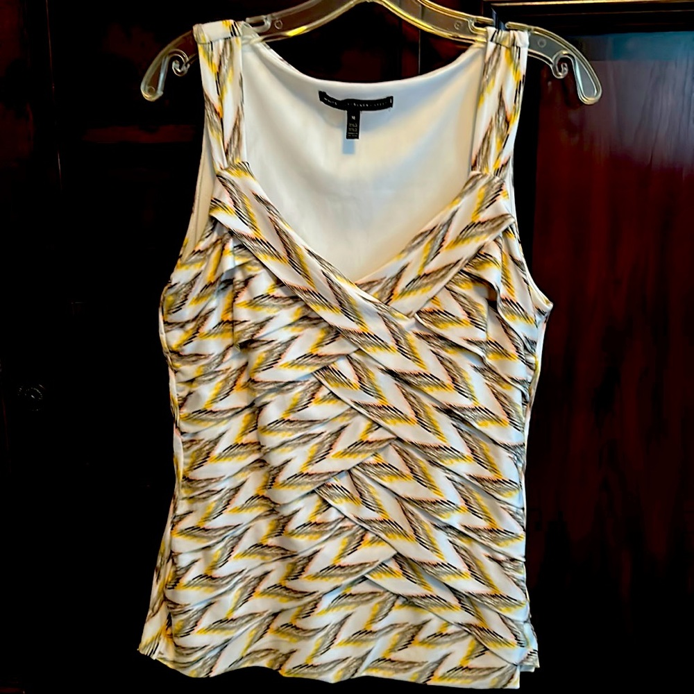 Sleeveless WHBM top. Beautiful print Flattering ruching. Size med